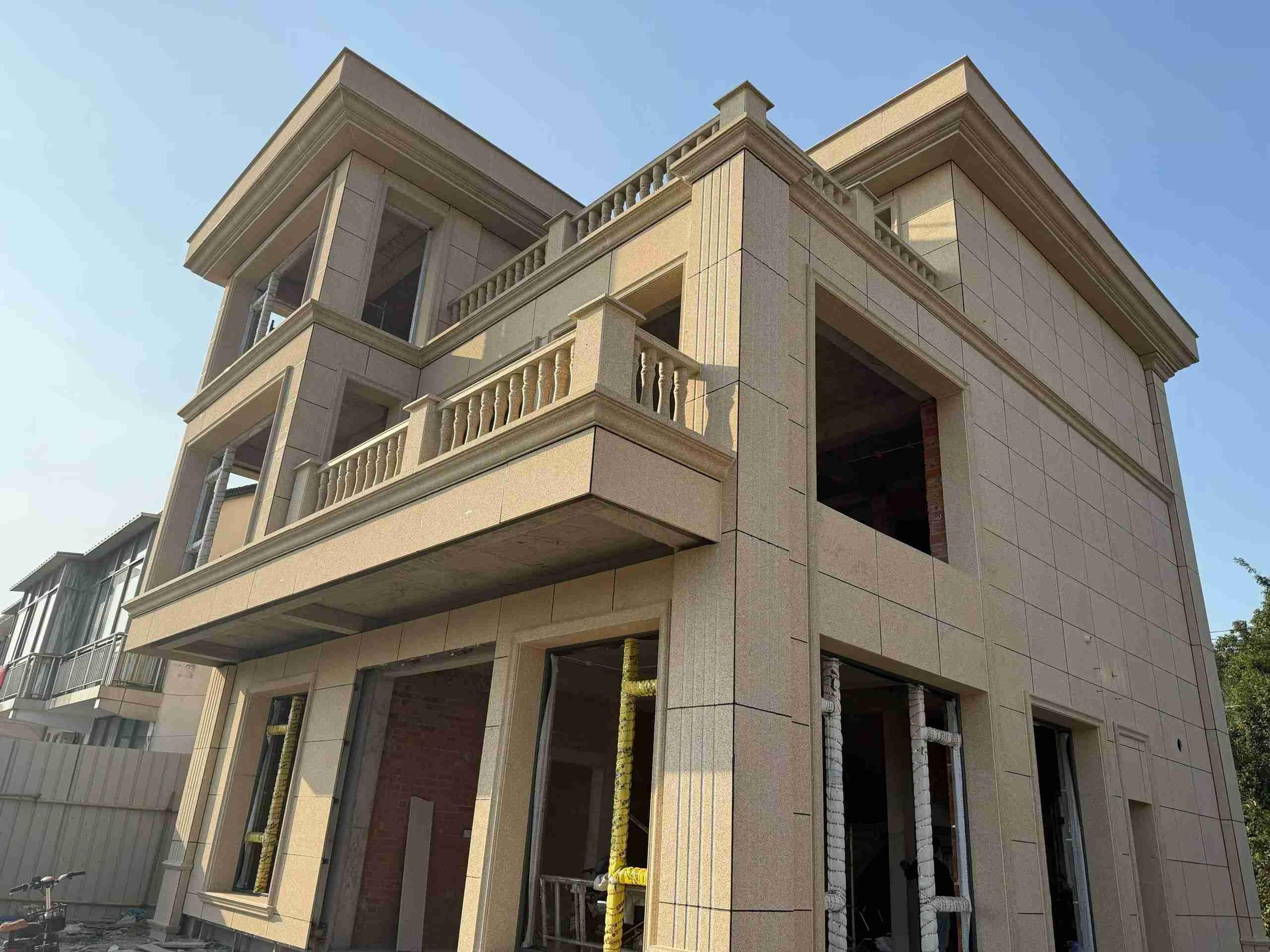 承德 黄金麻花岗岩石材荔枝面外墙干挂效果展示