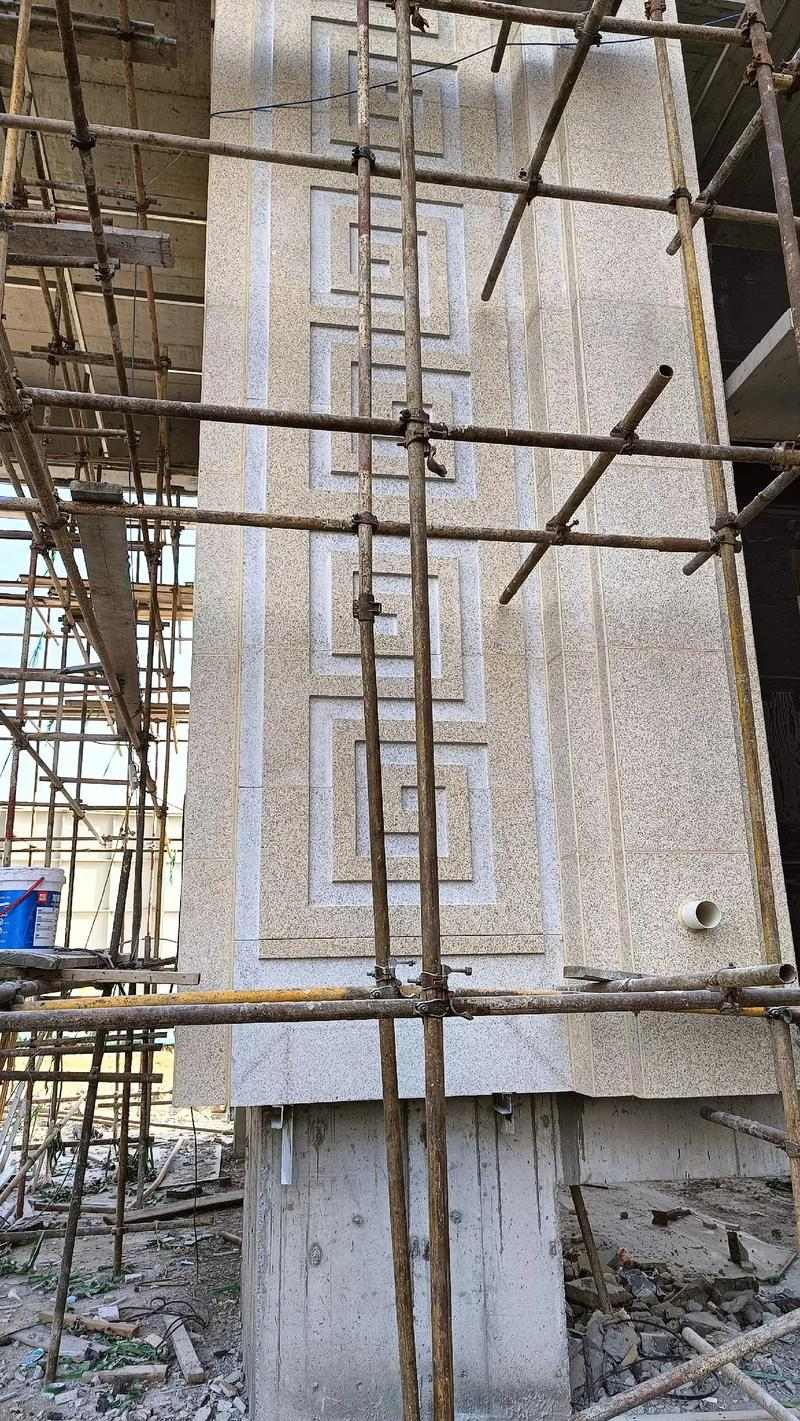 承德 黄金麻花岗岩别墅外墙干挂回纹造型效果